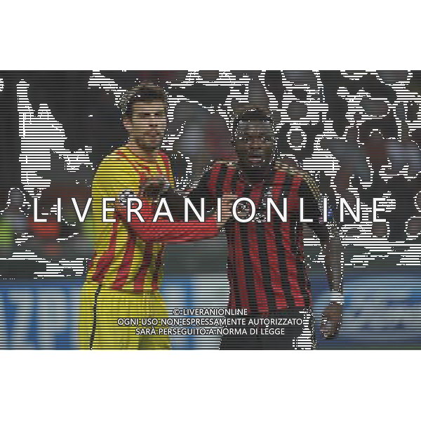 UEFA Champions League - Fase a gironi 3¡ giornata gruppo H Milano 22-10-2013 Stadio Giuseppe Meazza San Siro Milan - Barcellona nella foto Gerard Pique\' (Barcellona) e sulla DX Sulley Muntari (Milan) foto Roberto Garavaglia - ag. Aldo Liverani
