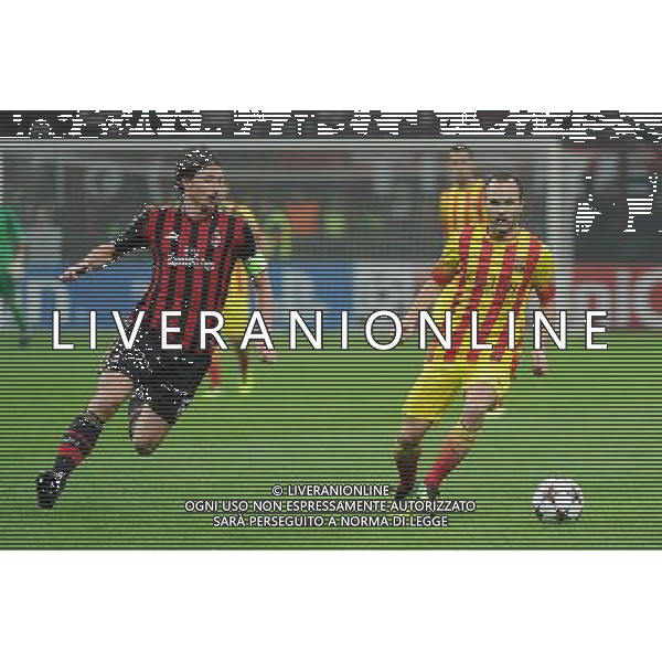UEFA Champions League - Fase a gironi 3¡ giornata gruppo H Milano 22-10-2013 Stadio Giuseppe Meazza San Siro Milan - Barcellona nella foto Andres Iniesta (Barcellona) e sulla SX Riccardo Montolivo (Milan) foto Roberto Garavaglia - ag. Aldo Liverani