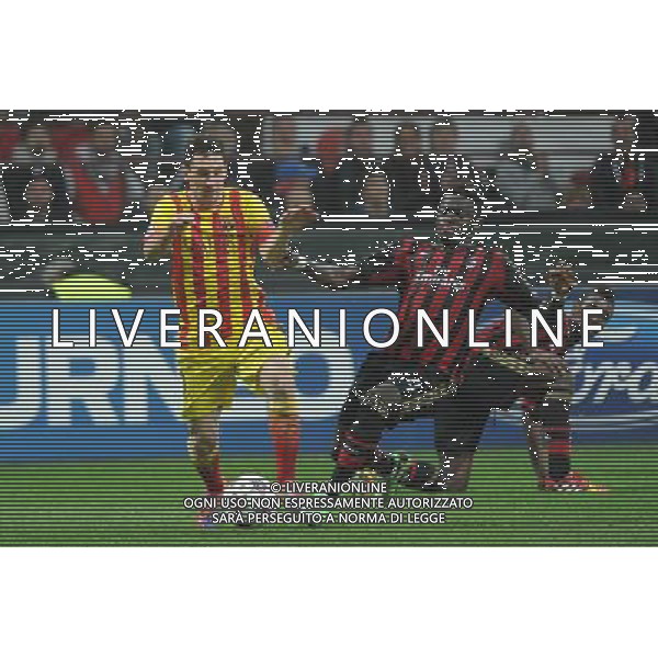 UEFA Champions League - Fase a gironi 3¡ giornata gruppo H Milano 22-10-2013 Stadio Giuseppe Meazza San Siro Milan - Barcellona nella foto Lionel Messi (Barcellona) e sulla DX Sulley Muntari (Milan) foto Roberto Garavaglia - ag. Aldo Liverani
