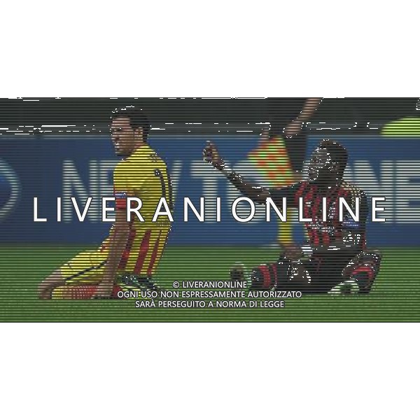 UEFA Champions League 2013/2014 Gruppo H Milano - 22.10.2013 Milan-Barcellona Nella Foto:Muntari Sulley-Busquets Sergio /Ph.Vitez-Ag. Aldo Liverani