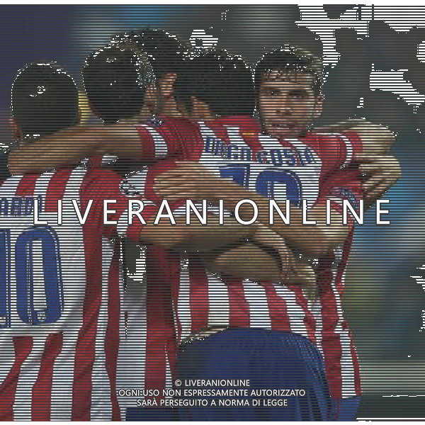 22.10.2013, Ernst Happel Stadion, AUT, UEFA Champions League, FK Austria Wien vs Atletico Madrid, Gruppe G, im Bild Torjubel mit Arda Turan, (Atletico Madrid, #10), Costa Diego Da Silva, (Atletico Madrid, #19) und Zapata Emiliano Adrian Insua, (Atletico Madrid, #22) // during the UEFA Champions League group G match between FK Austria Vienna and Club Atletico de Madrid at the Ernst Happel Stadion in Vienna, Austria on 2013/10/22. Â©photoshot/AGENZIA ALDO LIVERANI SAS - ITALY ONLY - FK Austria Vienna vs Atletico Madrid UEFA Champions gruppo G a Ernst Happel Stadion di Vienna, in Austria 22 ottobre 2013 