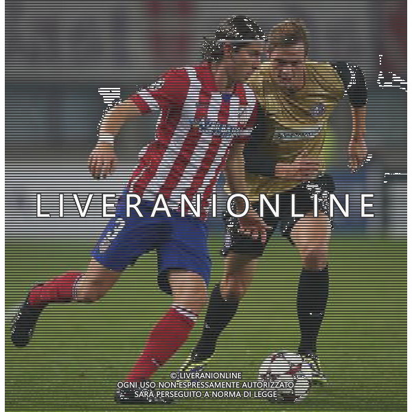 22.10.2013, Ernst Happel Stadion, AUT, UEFA Champions League, FK Austria Wien vs Atletico Madrid, Gruppe G, im Bild Filipe Kasmirski, (Atletico Madrid, #3) und Roman Kienast, (FK Austria Wien, #24) // during the UEFA Champions League group G match between FK Austria Vienna and Club Atletico de Madrid at the Ernst Happel Stadion in Vienna, Austria on 2013/10/22. Â©photoshot/AGENZIA ALDO LIVERANI SAS - ITALY ONLY - FK Austria Vienna vs Atletico Madrid UEFA Champions gruppo G a Ernst Happel Stadion di Vienna, in Austria 22 ottobre 2013 