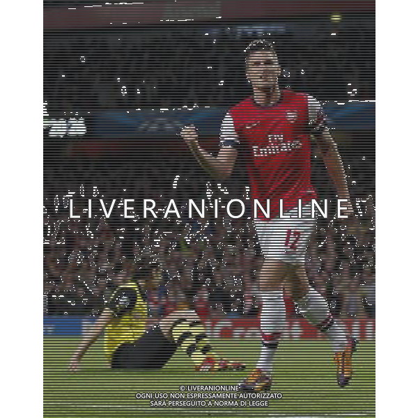 (131023) -- LONDON, Oct. 23, 2013 () -- Olivier Giroud of Arsenal FC celebrates scoring during the UEFA Champions League Group F match between Arsenal FC and Borussia Dortmund at Emirates Stadium in London, Britain on Oct. 22, 2013. Arsenal lost 1-2.(/Wang Lili) ©PHOTOSHOT/AGENZIA ALDO LIVERANI SAS - ITALY ONLY - Arsenal v Borussia Dortmund UEFA Champions League Group F 22 ottobre 2013