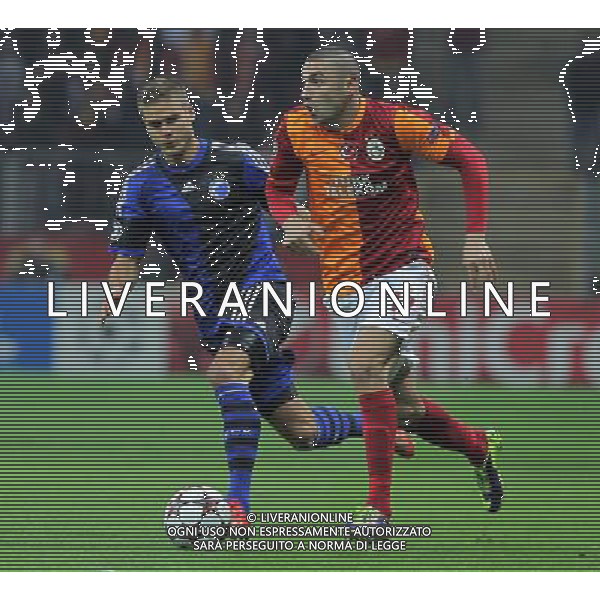 UEFA Champions League group B match between Galatasaray and FC Copenhagen at Turk Telekom Arena Stadium on October 23, 2013 in Istanbul, Turkey Pictured: Burak Yilmaz of Galatasaray and Rurik Gislason of FC Copenhagen. LIGA MISTRZOW SEZON 2013/2014 PILKA NOZNA GALATASARAY ISTAMBUL vs FC KOPENHAGA FOT.SESKIM PHOTO/NEWSPIX.PL TURKEY, GERMANY, AUSTRIA AND UK OUT !!! --- Newspix.pl ©PHOTOSHOT/AGENZIA ALDO LIVERANI SAS - ITALY ONLY - EDITORIAL USE ONLY *** Local Caption *** www.newspix.pl mail us: info@newspix.pl call us: 0048 022 23 22 222 --- Polish Picture Agency by Ringier Axel Springer Poland
