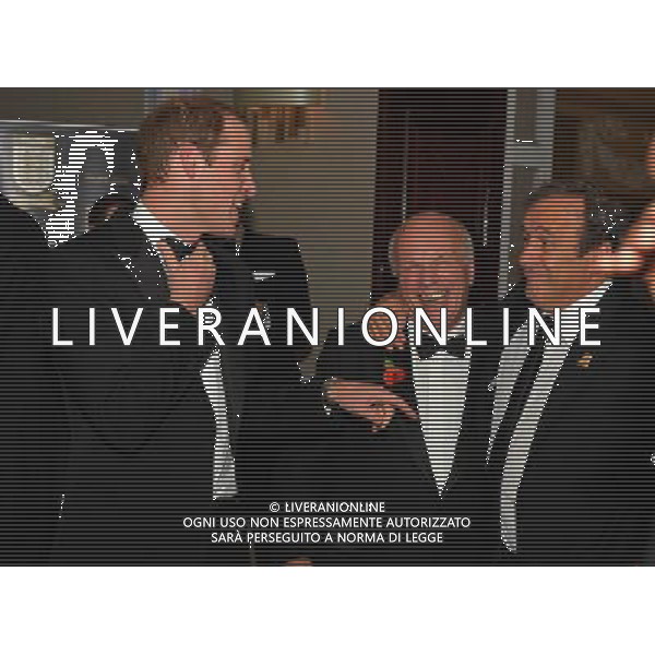 Britain\'s Prince William, Duke of Cambridge (L) shares a joke with FA Chairman Greg Dyke (C) and UEFA President Michel Platini (R) as he attends The Football Association\'s 150th Anniversary Gala Dinner at the Grand Connaught Rooms in central London on October 26, 2013. The Duke of Cambridge is president of the Football Association, which was founded 150 years ago on October 26, 1863. The event marks the day when a group of men representing a dozen London and suburban clubs met at the Freemason\'s Tavern in London, to draw up the rules of a sport that went on to become the most popular in the world. ©photoshot/AGENZIA ALDO LIVERANI SAS - ITALY ONLY - Cena di gala per celebrare il 150mo Anniversario della Federcalcio al Grand Connaught Rooms di Londra