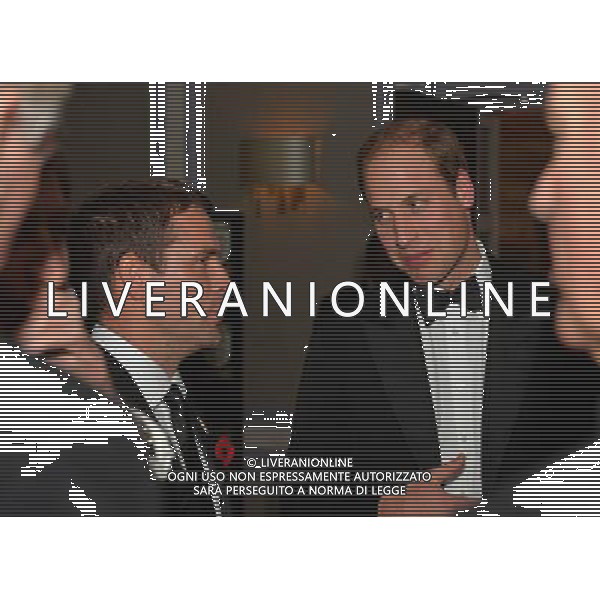 Britain\'s Prince William, Duke of Cambridge (R) talks to former England striker Michael Owen (L) as he attends The Football Association\'s 150th Anniversary Gala Dinner at the Grand Connaught Rooms in central London on October 26, 2013. The Duke of Cambridge is president of the Football Association, which was founded 150 years ago on October 26, 1863. The event marks the day when a group of men representing a dozen London and suburban clubs met at the Freemason\'s Tavern in London, to draw up the rules of a sport that went on to become the most popular in the world. ©photoshot/AGENZIA ALDO LIVERANI SAS - ITALY ONLY - Cena di gala per celebrare il 150mo Anniversario della Federcalcio al Grand Connaught Rooms di Londra