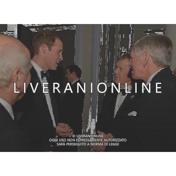 Britain\'s Prince William, Duke of Cambridge (L) talks to 1966 England World Cup team members Geoff Hurst (2nd R) and Martin Peters (R) as he attends The Football Association\'s 150th Anniversary Gala Dinner at the Grand Connaught Rooms in central London on October 26, 2013. The Duke of Cambridge is president of the Football Association, which was founded 150 years ago on October 26, 1863. The event marks the day when a group of men representing a dozen London and suburban clubs met at the Freemason\'s Tavern in London, to draw up the rules of a sport that went on to become the most popular in the world. ©photoshot/AGENZIA ALDO LIVERANI SAS - ITALY ONLY - Cena di gala per celebrare il 150mo Anniversario della Federcalcio al Grand Connaught Rooms di Londra