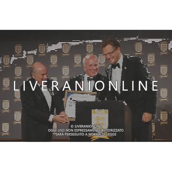 FIFA President Joseph S. Blatter (L) and FIFA Secretary General Jerome Valcke (R) make a presentation to FA Chairman Greg Dyke during the FA150 Gala Dinner commemorating the Football Association\'s 150th year at the Grand Connaught Rooms on October 26, 2013 in London, England. ©photoshot/AGENZIA ALDO LIVERANI SAS - ITALY ONLY - Cena di gala per celebrare il 150mo Anniversario della Federcalcio al Grand Connaught Rooms di Londra