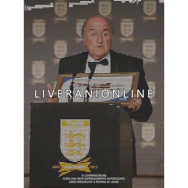 FIFA President Joseph S. Blatter talks on stage before making a presentation to FA Chairman Greg Dyke during the FA150 Gala Dinner commemorating the Football Association\'s 150th year at the Grand Connaught Rooms on October 26, 2013 in London, England. ©photoshot/AGENZIA ALDO LIVERANI SAS - ITALY ONLY - Cena di gala per celebrare il 150mo Anniversario della Federcalcio al Grand Connaught Rooms di Londra