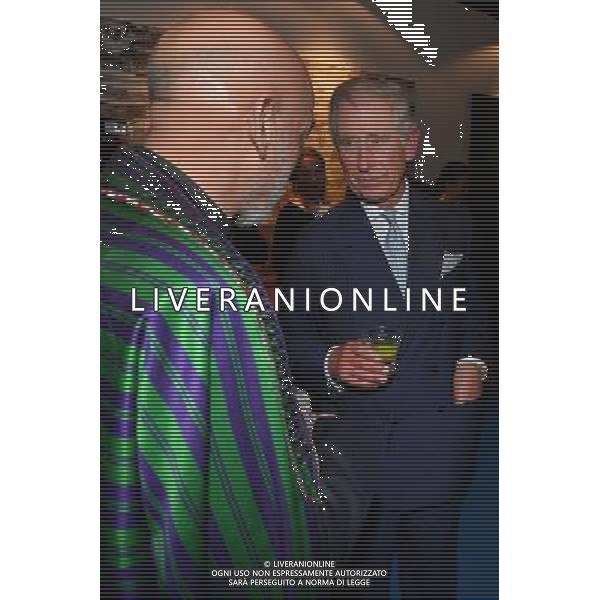 Britain\'s Prince Charles, Prince of Wales (R), speaks with Afghan President Hamid Karzai (L) during a reception and gala dinner at the end of the opening day of the 9th World Islamic Economic Forum in London on October 29, 2013. The Prince of Wales addressed visiting dignatories and guests at the gala dinner as London plays host to the first World Islamic Forum outside the Muslim world. ©photoshot/AGENZIA ALDO LIVERANI SAS - ITALY ONLY - REALI INGLESI: Il principe Carlo d\'Inghilterra alla cena di gala al 9¡ World Islamic Economic Forum (Forum mondiale islamico) a Londra il 29 Ottobre 2013