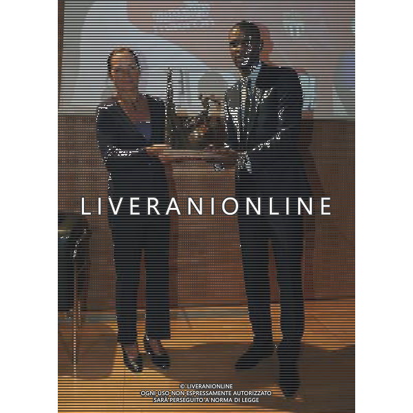 XIII Premio Giacinto Facchetti Gazzetta dello Sport \'Il Bello del Calcio\' Milano - 04.11.2013 Nella Foto:Abidal premiato dalla signora facchetti /Ph.Vitez-Ag. Aldo Liverani