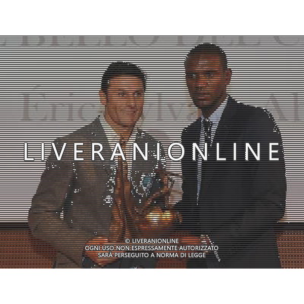 XIII Premio Giacinto Facchetti Gazzetta dello Sport \'Il Bello del Calcio\' Milano - 04.11.2013 Nella Foto:Abidal con il premio e zanetti /Ph.Vitez-Ag. Aldo Liverani