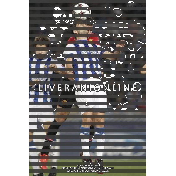 05.11.2013, Anoeta Stadion, San Sebastian, ESP, UEFA CL, Real Sociedad vs Manchester United, Gruppe A, im Bild Real Sociedad\'s Markel Bergara (f) and Manchester United FC\'s Robin Van Persie // Real Sociedad\'s Markel Bergara (f) and Manchester United FC\'s Robin Van Persie during UEFA Champions League group A match between Real Sociedad and Manchester United at the Anoeta Stadion in San Sebastian, Spain on 2013/11/06. *****ATTENTION - OUT of ESP, SUI***** ©PHOTOSHOT/AGENZIA ALDO LIVERANI SAS - ITALY ONLY - EDITORIAL USE ONLY