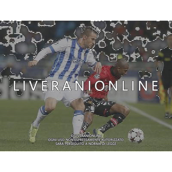 05.11.2013, Anoeta Stadion, San Sebastian, ESP, UEFA CL, Real Sociedad vs Manchester United, Gruppe A, im Bild Real Sociedad\'s Haris Seferovic (l) and Manchester United FC\'s Ashley Young // Real Sociedad\'s Haris Seferovic (l) and Manchester United FC\'s Ashley Young during UEFA Champions League group A match between Real Sociedad and Manchester United at the Anoeta Stadion in San Sebastian, Spain on 2013/11/06. *****ATTENTION - OUT of ESP, SUI***** ©PHOTOSHOT/AGENZIA ALDO LIVERANI SAS - ITALY ONLY - EDITORIAL USE ONLY
