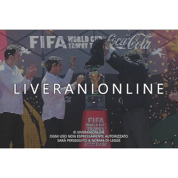 (131106) -- ILOPANGO, Nov. 6, 2013 () -- President of El Salvador\'s National Sports Institute (INDES) Jaime Rodriguez (R) unveils the FIFA World Cup Trophy at the Ilopango\'s Airport of San Salvador, capital of El Salvador, on Nov. 5, 2013. The trophy will remain for two days in San Salvador, as a part of the FIFA World Cup Trophy Tour which began in Brazil on Sept. 12 and will conclude before the start of the FIFA World Cup Brazil 2014, after visiting 89 countries. (/Oscar Rivera) (rt) (sp) ©photoshot/AGENZIA ALDO LIVERANI SAS - ITALY ONLY - Il trofeo della coppa del mondo FIFA World Cup Trophy, all\'aeroporto del Ilopango di San Salvador, capitale di El Salvador, 5 Novembre 2013 dove rimarra\' per due giorni come parte del Tour che si concludera\' dopo aver visitato 89 paesi