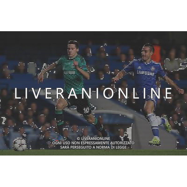 Shalke\'s Julian Draxler despite the attentions of Chelsea\'s Cesar Azpilicueta Photo by Kieran Galvin/CameraSport Football - UEFA Champions League Group E - Chelsea v Schalke - Wednesday 6th November 2013 - Stamford bridge - London Â© CameraSport - 43 Linden Ave. Countesthorpe. Leicester. England. LE8 5PG - Tel: +44 (0) 116 277 4147 - admin@camerasport.com - www.camerasport.com AG ALDO LIVERANI SAS ONLY ITALY
