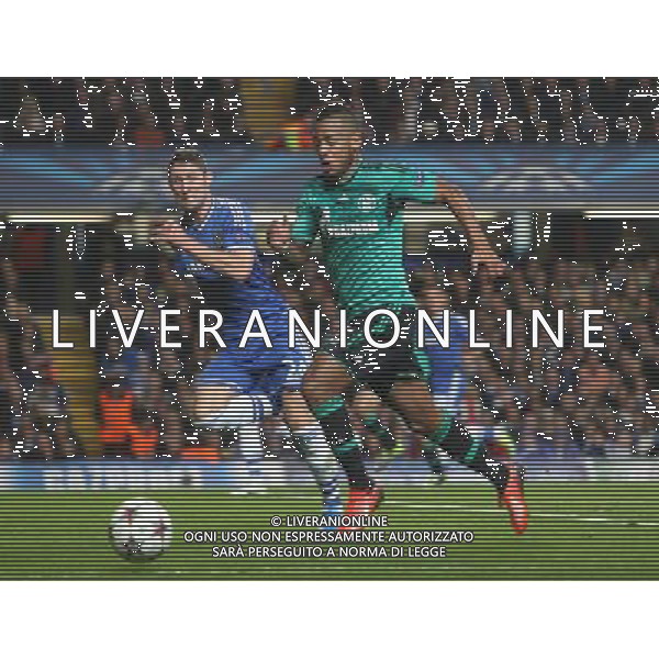 Shalke\'s Dennis Aogo whilst Chelsea\'s Gary Cahill looks on Photo by Kieran Galvin/CameraSport Football - UEFA Champions League Group E - Chelsea v Schalke - Wednesday 6th November 2013 - Stamford bridge - London Â© CameraSport - 43 Linden Ave. Countesthorpe. Leicester. England. LE8 5PG - Tel: +44 (0) 116 277 4147 - admin@camerasport.com - www.camerasport.com AG ALDO LIVERANI SAS ONLY ITALY