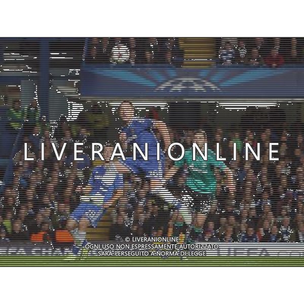 Chelsea\'s John Terry clears away Photo by Kieran Galvin/CameraSport Football - UEFA Champions League Group E - Chelsea v Schalke - Wednesday 6th November 2013 - Stamford bridge - London Â© CameraSport - 43 Linden Ave. Countesthorpe. Leicester. England. LE8 5PG - Tel: +44 (0) 116 277 4147 - admin@camerasport.com - www.camerasport.com AG ALDO LIVERANI SAS ONLY ITALY