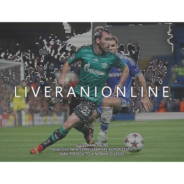 Shalke\'s Christian Fuchs despite the attentions of Chelsea\'s Branislav Ivanovic Photo by Kieran Galvin/CameraSport Football - UEFA Champions League Group E - Chelsea v Schalke - Wednesday 6th November 2013 - Stamford bridge - London Â© CameraSport - 43 Linden Ave. Countesthorpe. Leicester. England. LE8 5PG - Tel: +44 (0) 116 277 4147 - admin@camerasport.com - www.camerasport.com AG ALDO LIVERANI SAS ONLY ITALY