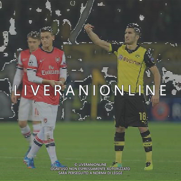 UEFA Champions League match between Borussia Dortmund and Arsenal FC on November 06, 2013 at the Signal Iduna Park stadium in Dortmund, Germany. 06.11.2013, Signal Iduna Park, Dortmund, GER, UEFA CL, Borussia Dortmund vs FC Arsenal, Gruppe F, im Bild Mesut Oezil #11 (Arsenal FC), Nuri Sahin #18 (Borussia Dortmund) // during UEFA Champions League group F match between Borussia Dortmund and Arsenal FC at the Signal Iduna Park in Dortmund, Germany on 2013/11/07. EXPA Pictures © 2013, PhotoCredit: EXPA/ Eibner-Pressefoto/ Schueler *****ATTENTION - OUT of GER***** ©Photoshot/Ag. Aldo Liverani s.a.s.-Only Italy-Editorial Use Only