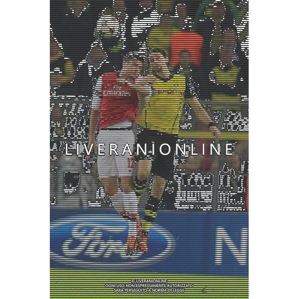 UEFA Champions League match between Borussia Dortmund and Arsenal FC on November 06, 2013 at the Signal Iduna Park stadium in Dortmund, Germany. 06.11.2013, Signal Iduna Park, Dortmund, GER, UEFA CL, Borussia Dortmund vs FC Arsenal, Gruppe F, im Bild Neven Subotic #4 (Borussia Dortmund) im Kopfballduell gegen Olivier Giroud #12 (Arsenal FC), Aktion, Action // during UEFA Champions League group F match between Borussia Dortmund and Arsenal FC at the Signal Iduna Park in Dortmund, Germany on 2013/11/07. EXPA Pictures © 2013, PhotoCredit: EXPA/ Eibner-Pressefoto/ Schueler *****ATTENTION - OUT of GER***** ©Photoshot/Ag. Aldo Liverani s.a.s.-Only Italy-Editorial Use Only