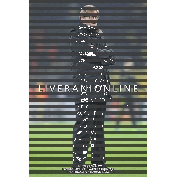 UEFA Champions League match between Borussia Dortmund and Arsenal FC on November 06, 2013 at the Signal Iduna Park stadium in Dortmund, Germany. 06.11.2013, Signal Iduna Park, Dortmund, GER, UEFA CL, Borussia Dortmund vs FC Arsenal, Gruppe F, im Bild Trainer Juergen Klopp (Borussia Dortmund) mit grimmigem Blick, verschraenkten Armen im Regen // during UEFA Champions League group F match between Borussia Dortmund and Arsenal FC at the Signal Iduna Park in Dortmund, Germany on 2013/11/07. EXPA Pictures © 2013, PhotoCredit: EXPA/ Eibner-Pressefoto/ Schueler *****ATTENTION - OUT of GER***** ©Photoshot/Ag. Aldo Liverani s.a.s.-Only Italy-Editorial Use Only