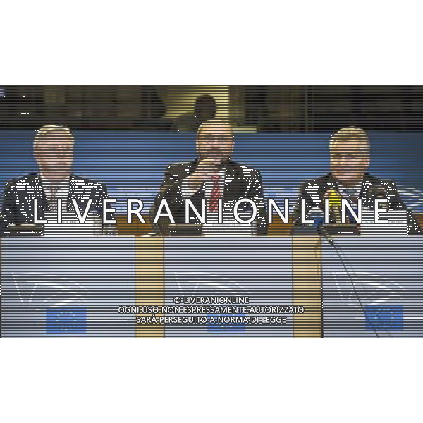 European Parliament President Martin Schulz, center, former European Parliament President Pat Cox, left, and former Polish President Aleksander Kwasniewski address the media on the findings of the European Parliament\'s monitoring mission to Ukraine, at the European Parliament in Brussels, Belgium on 13.11.2013 The mission extended till 28 November till Vilnus summit by Wiktor Dabkowski AG ALDO LIVERANI SAS ONLY ITALY