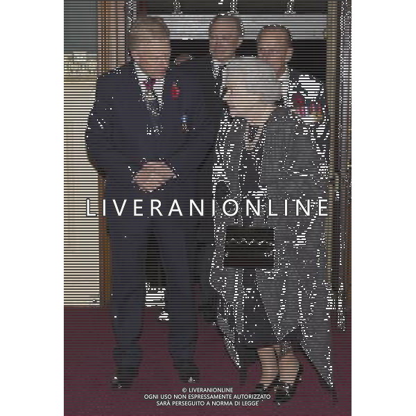 The Queen and The Duke of Edinburgh arrive at the annual Royal British Legion Festival of Remembrance. The Queen is accompanied (to the left) by Vice President of the British Legion Vice Admiral Peter Wilkinson CB CVO in the Royal Festival Hall, London on the 9th November 2013 ©photohsot/AGENZIA ALDO LIVERANI SAS - ITALY ONLY - EDITORIAL USE ONLY ©photoshot/AGENZIA ALDO LIVERANI SAS - ITALY ONLY - EDITORIAL USE ONLY - REALI INGLESI: La Regina Elisabetta II d\'Inghilterra e il marito Filippo Duca di Edimburgo arrivano durante l\'annuale Royal British Legion Festival of Remembrance a Londra