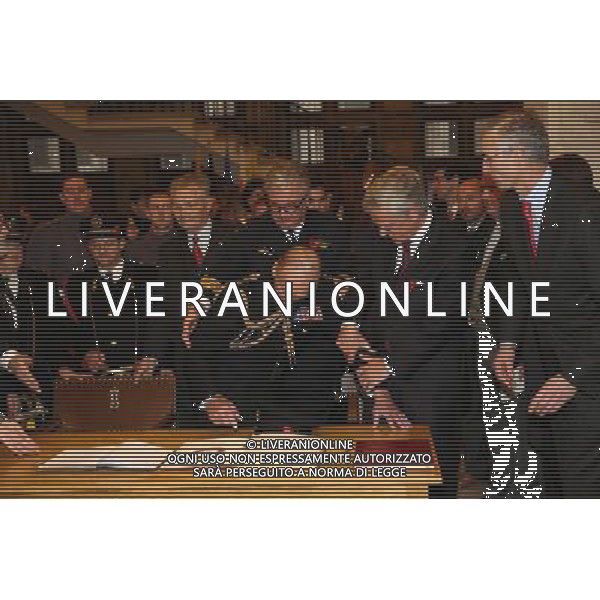 YPRES, BELGIUM - NOVEMBER 11: Prince Philip, Duke of Edinburgh, Prince Laurent of Belgium and Flemisch Minister President Kris Peeters sign the Gilden Book at the Townhall on November 11, 2013 in Ypres, Belgium. ©photoshot/AGENZIA ALDO LIVERANI SAS - ITALY ONLY - EDITORIAL USE ONLY - REALI INGLESI: Filippo Duca di Edimburgo al Municipio di Ypres, in Belgio 11 Novembre 2013