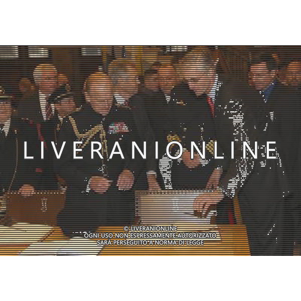 YPRES, BELGIUM - NOVEMBER 11: Prince Philip, Duke of Edinburgh signs the Gilden Book at the Townhall on November 11, 2013 in Ypres, Belgium. ©photoshot/AGENZIA ALDO LIVERANI SAS - ITALY ONLY - EDITORIAL USE ONLY - REALI INGLESI: Filippo Duca di Edimburgo al Municipio di Ypres, in Belgio 11 Novembre 2013
