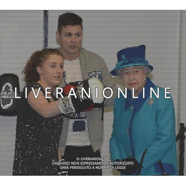 MANCHESTER, ENGLAND - NOVEMBER 14: Queen Elizabeth II speaks to boxer Victoria Boardman and coach Thomas McDonagh during a visit to The Factory Youth Zone on November 14, 2013 in Manchester, England. ©photoshot/AGENZIA ALDO LIVERANI SAS - ITALY ONLY - EDITORIAL USE ONLY - Reali Inglesi: La Regina Elisabetta II d\'inghilterra e il marito Filippo Duca di Edimburgo in Visita a Manchester Gran Bretagna - 14 novembre 2013