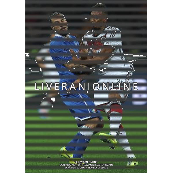 Amichevole Milano - 15.11.2013 Italia-Germania Nella Foto:scontro osvaldo boateng /Ph.Vitez-Ag. Aldo Liverani