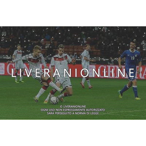 Amichevole Milano - 15.11.2013 Italia-Germania Nella Foto:reus e bender si ostacolano davanti alla porta vuota dopo il palo di howedes /Ph.Vitez-Ag. Aldo Liverani