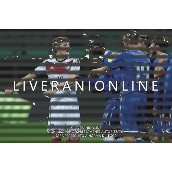 Amichevole Milano - 15.11.2013 Italia-Germania Nella Foto:scontro fra i giocatori della germania e quelli dell\'italia dopo un fallo di kroos su thiago motta /Ph.Vitez-Ag. Aldo Liverani
