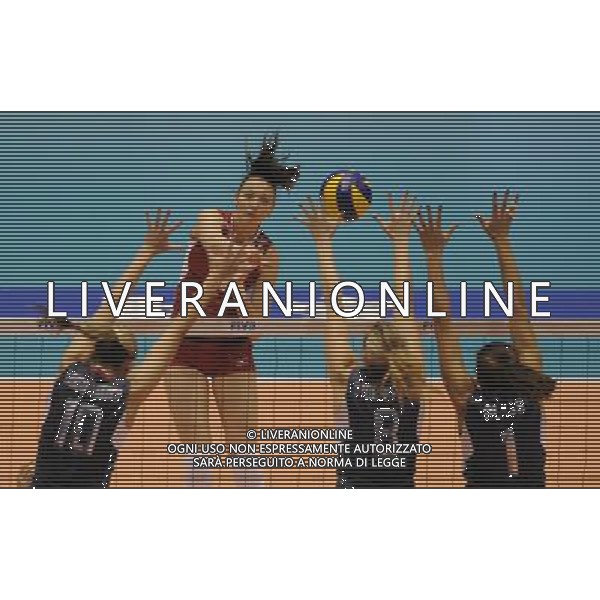(131116) -- TOKYO, Nov. 16, 2013 () -- Victoria Chaplina (2nd L) of Russia spikes the ball during a match against the United States at the World Grand Champions Cup 2013 at Tokyo Metropolitan Gymnasium in Tokyo, Japan, on Nov. 15, 2013. Russia lost 2-3. (/Stringer) ©PHOTOSHOT/AGENZIA ALDO LIVERANI SAS - ITALY ONLY - EDITORIAL USE ONLY - World Grand Champions Cup 2013 al Tokyo Metropolitan Gymnasium di Tokyo, in Giappone, il 16 novembre 2013