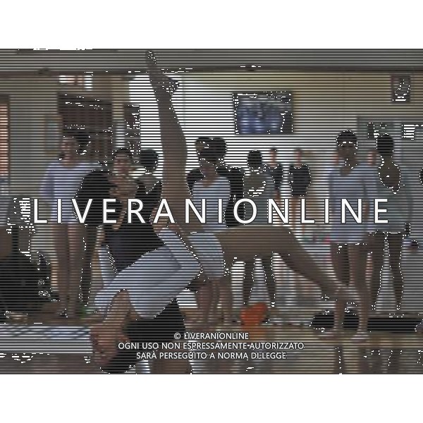 (131117) -- JAKARTA, Nov. 17, 2013 () -- Ballet dancers from Namarina Ballet School do exercises at the gym room for training in Jakarta, Indonesia, Nov. 17, 2013. (/Agung Kuncahya B.) ©photoshot/AGENZIA ALDO LIVERANI SAS - ITALY ONLY - EDITORIAL USE ONLY - Ballerini al Namarina Ballet School fanno esercizi nella palestra per la formazione a Giacarta, in Indonesia, 17 novembre 2013.