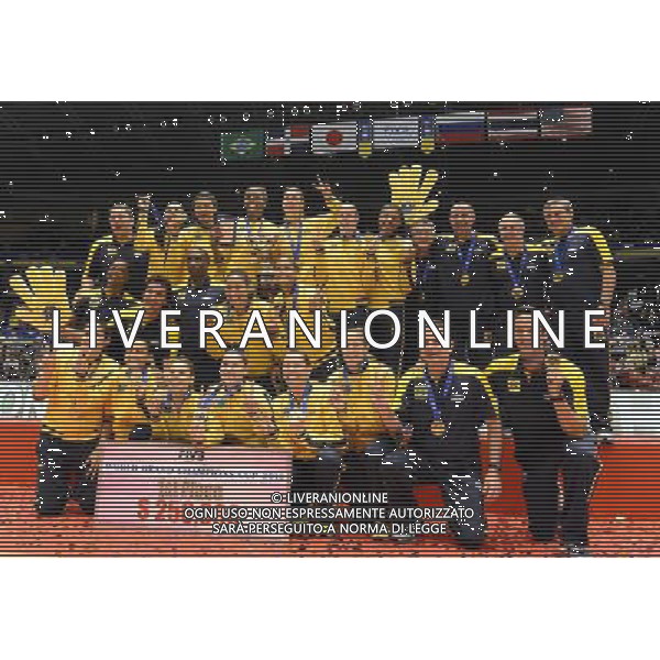 (131117) -- TOKYO, Nov. 17, 2013 () -- Players of Brazil pose with the trophy at the awarding ceremony after beating host country Japan in the final of the 2013 FIVB World Grand Champions Cup in Tokyo, on Nov. 17, 2013. (/Ma Ping) ©photoshot/AGENZIA ALDO LIVERANI SAS - ITALY ONLY - EDITORIAL USE ONLY ©PHOTOHSOT/AGENZIA ALDO LIVERANI SAS - ITALY ONLY - World Grand Champions Cup 2013 al Tokyo Metropolitan Gymnasium di Tokyo, in Giappone, novembre 2013
