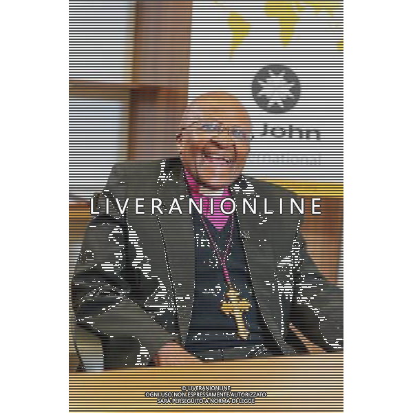 Archbishop Desmond Tutu seen at the London offices of St. John International. The organisation is best known around the world for its organisation, the St John Ambulance service. Tutu, as Prior of St John South Africa, is an advocate of the ST JOHN MOTHER AND CHILD PROGRAMME which aims to tackle maternal and newborn mortality rates in Southern Africa. The 82 year old cleric has mostly retired from public life but made this rare appearance to coment on the vote to ordain female bishops. He said he was delighted with the news. contact: louisa.boyle@orderofstjohn.org tel +442075539312 ©photoshot/AGENZIA ALDO LIVERANI SAS - ITALY ONLY - Desmond Mpilo Tutu arcivescovo anglicano e attivista sudafricano presso gli uffici St. John International di Londra