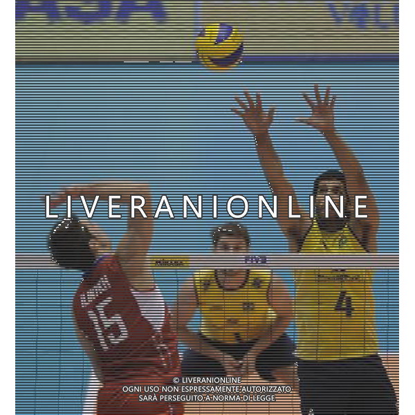 (131123) -- TOKYO, Nov. 23, 2013 () -- Wallace De Souza (1st, R) of Brazil blocks the ball during the FIVB World Grand Champions Cup 2013 against Russia at Tokyo Metlopolitan Gymnasium in Tokyo, Japan, Nov. 23, 2013. Russia won 3-2. (/Stringer) AG ALDO LIVERANI SAS ONLY ITALY