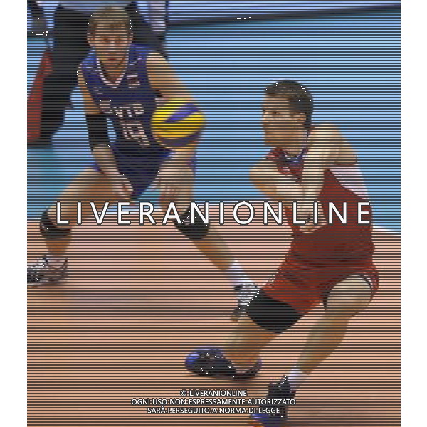 (131123) -- TOKYO, Nov. 23, 2013 () -- Evgeny Sivozhelez (R) of Russia recieves the ball during the FIVB World Grand Champions Cup 2013 against Brazil at Tokyo Metlopolitan Gymnasium in Tokyo, Japan, Nov. 23, 2013. Russia won 3-2. (/Stringer) AG ALDO LIVERANI SAS ONLY ITALY