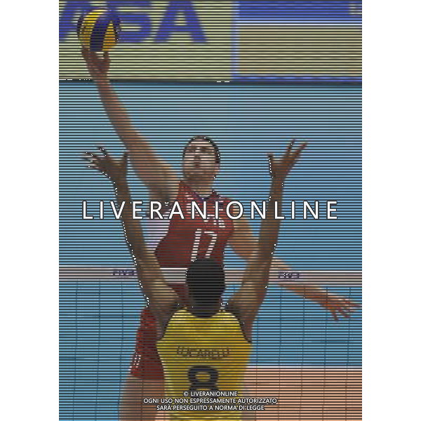(131123) -- TOKYO, Nov. 23, 2013 () -- Maxim Mikhaylov (Rear) of Russia spikes the ball during the FIVB World Grand Champions Cup 2013 against Brazil at Tokyo Metlopolitan Gymnasium in Tokyo, Japan, Nov. 23, 2013. Russia won 3-2. (/Stringer) AG ALDO LIVERANI SAS ONLY ITALY