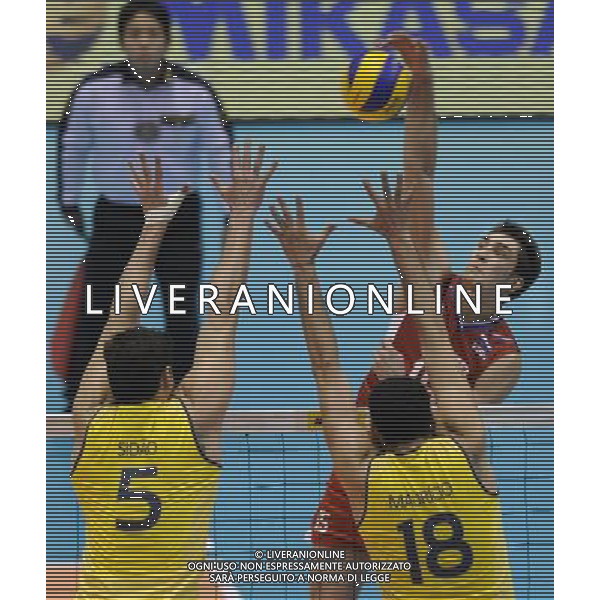 (131123) -- TOKYO, Nov. 23, 2013 () -- Dmitriy Ilinykh (Rear) of Russia spikes the ball during the FIVB World Grand Champions Cup 2013 against Brazil at Tokyo Metlopolitan Gymnasium in Tokyo, Japan, Nov. 23, 2013. Russia won 3-2. (/Stringer) AG ALDO LIVERANI SAS ONLY ITALY