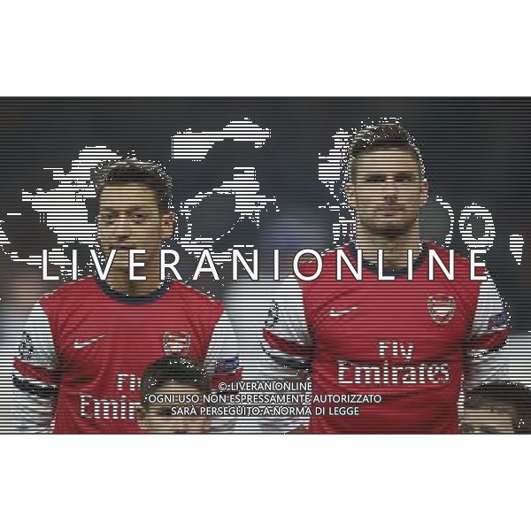 (131127) -- LONDON, Nov. 27, 2013 () -- Mesut Ozil(L) and Olivier Giroud of Arsenal look on ahead of the UEFA Champions League Group F match between Arsenal and Marseille at Emirates Stadium in London, Britain on Nov. 26, 2013. Arsenal won 2-0.(/Wang Lili) ©PHOTOSHOT/AGENZIA ALDO LIVERANI SAS - ITALY ONLY - ARSENAL VS MARSIGLIA partita di UEFA Champions League Gruppo F allo stadio Emirates Stadium di Londra, Gran Bretagna il 26 novembre 2013. L\'Arsenal ha vinto 2-0.