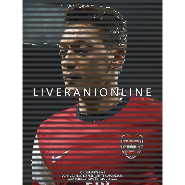 (131127) -- LONDON, Nov. 27, 2013 () -- Mesut Ozil of Arsenal reacts during the UEFA Champions League Group F match between Arsenal and Marseille at Emirates Stadium in London, Britain on Nov. 26, 2013. Arsenal won 2-0.(/Wang Lili) ©PHOTOSHOT/AGENZIA ALDO LIVERANI SAS - ITALY ONLY - ARSENAL VS MARSIGLIA partita di UEFA Champions League Gruppo F allo stadio Emirates Stadium di Londra, Gran Bretagna il 26 novembre 2013. L\'Arsenal ha vinto 2-0.
