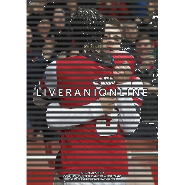 (131127) -- LONDON, Nov. 27, 2013 () -- Jack Wilshere (R) of Arsenal celebrates his first goal with teammate Bacary Sagna during the UEFA Champions League Group F match between Arsenal and Marseille at Emirates Stadium in London, Britain on Nov. 26, 2013. Arsenal won 2-0.(/Wang Lili) ©PHOTOSHOT/AGENZIA ALDO LIVERANI SAS - ITALY ONLY - ARSENAL VS MARSIGLIA partita di UEFA Champions League Gruppo F allo stadio Emirates Stadium di Londra, Gran Bretagna il 26 novembre 2013. L\'Arsenal ha vinto 2-0.