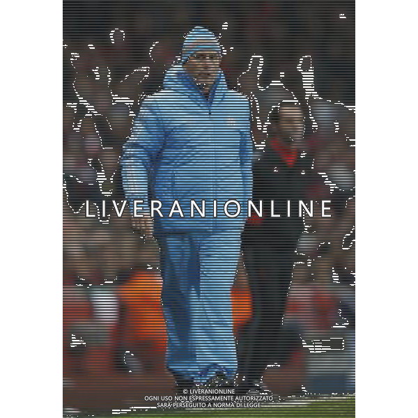 (131127) -- LONDON, Nov. 27, 2013 () -- Elie Baup, manager of Marseille reacts during the UEFA Champions League Group F match between Arsenal and Marseille at Emirates Stadium in London, Britain on Nov. 26, 2013. Marseille lost 0-2.(/Wang Lili) ©PHOTOSHOT/AGENZIA ALDO LIVERANI SAS - ITALY ONLY - ARSENAL VS MARSIGLIA partita di UEFA Champions League Gruppo F allo stadio Emirates Stadium di Londra, Gran Bretagna il 26 novembre 2013. L\'Arsenal ha vinto 2-0.