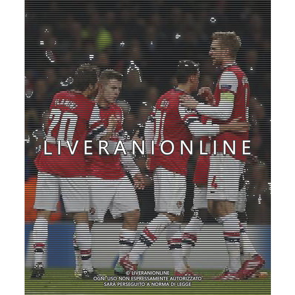 (131127) -- LONDON, Nov. 27, 2013 () -- Jack Wilshere (L) of Arsenal celebrates his second goal with teammates Mathieu Flamini (1st L), Mesut Ozil(2nd R) and Per Mertesacker during the UEFA Champions League Group F match between Arsenal and Marseille at Emirates Stadium in London, Britain on Nov. 26, 2013. Arsenal won 2-0.(/Wang Lili) ©PHOTOSHOT/AGENZIA ALDO LIVERANI SAS - ITALY ONLY - ARSENAL VS MARSIGLIA partita di UEFA Champions League Gruppo F allo stadio Emirates Stadium di Londra, Gran Bretagna il 26 novembre 2013. L\'Arsenal ha vinto 2-0.