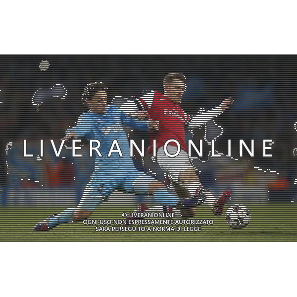 (131127) -- LONDON, Nov. 27, 2013 () -- Aaron Ramsey (R) of Arsenal vies with Lucas Mendes of Marseille during the UEFA Champions League Group F match at Emirates Stadium in London, Britain on Nov. 26, 2013. Arsenal won 2-0.(/Wang Lili) ©PHOTOSHOT/AGENZIA ALDO LIVERANI SAS - ITALY ONLY - ARSENAL VS MARSIGLIA partita di UEFA Champions League Gruppo F allo stadio Emirates Stadium di Londra, Gran Bretagna il 26 novembre 2013. L\'Arsenal ha vinto 2-0.