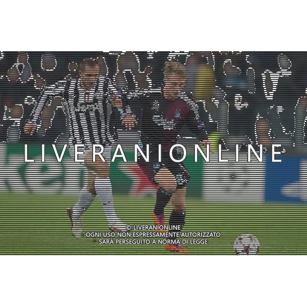 2013 © Matteo Bottanelli - MB Torino 27/11/13 - Football - Uefa Champions League - Juventus Copenhagen - shown in the picture: chiellini Jorgensen /Ag. Aldo Liverani s.a.s. 
