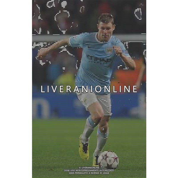 Manchester City\'s James Milner on the ball Photo by Dave Howarth/CameraSport Football - UEFA Champions League Group D - Manchester City v FC Viktoria Plzen - Wednesday 27th November 2013 - Ethiad Stadium - Manchester Â© CameraSport - 43 Linden Ave. Countesthorpe. Leicester. England. LE8 5PG - Tel: +44 (0) 116 277 4147 - admin@camerasport.com - www.camerasport.com AG ALDO LIVERANI SAS ONLY ITALY